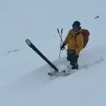 Jeff and Jill skier in snow