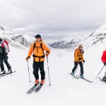 skiers mountain valley expedition